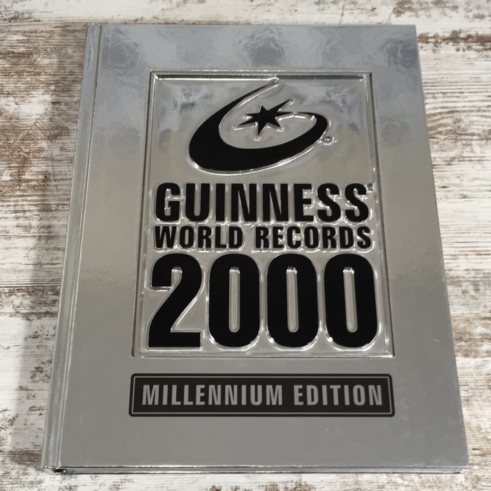 Vintage Y2K Guinness World Records 2000 Millennium Book Silver Foil Hardcover